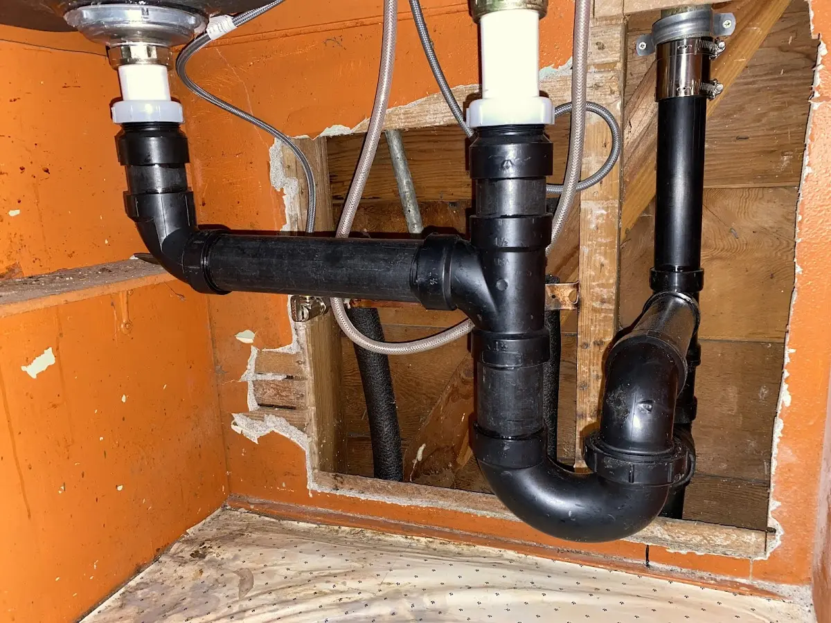 Professional Garbage Disposal Repair equipment and tools on the job in Elizabeth